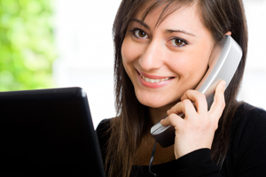 Woman smiling and talking on the phone